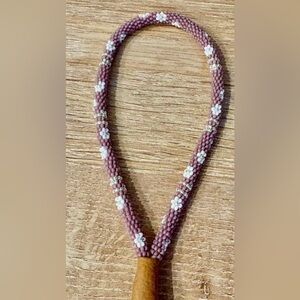 Elegant Beaded Necklace with Floral Accents